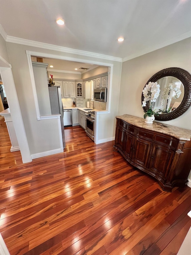 1258 Mace Ave, Bronx, NY 10469 - interior space with crown molding, a sink, and dark wood-type flooring