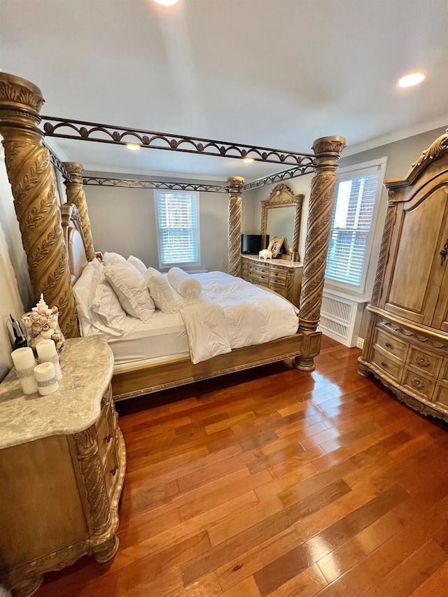 1258 Mace Ave, Bronx, NY 10469 - bedroom with hardwood / wood-style floors, baseboards, radiator, and crown molding
