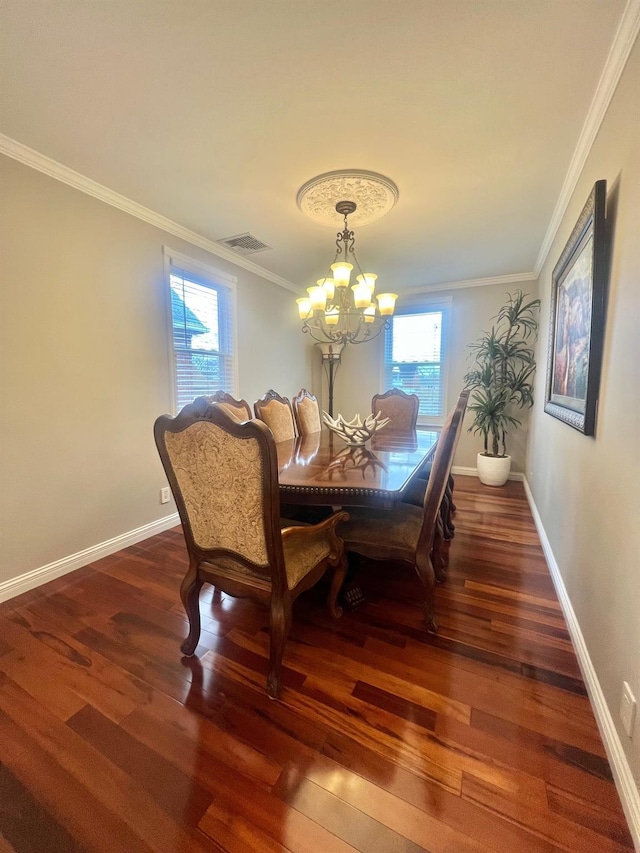 1258 Mace Ave, Bronx, NY 10469 - dining room featuring wood finished floors, visible vents, an inviting chandelier, and crown molding