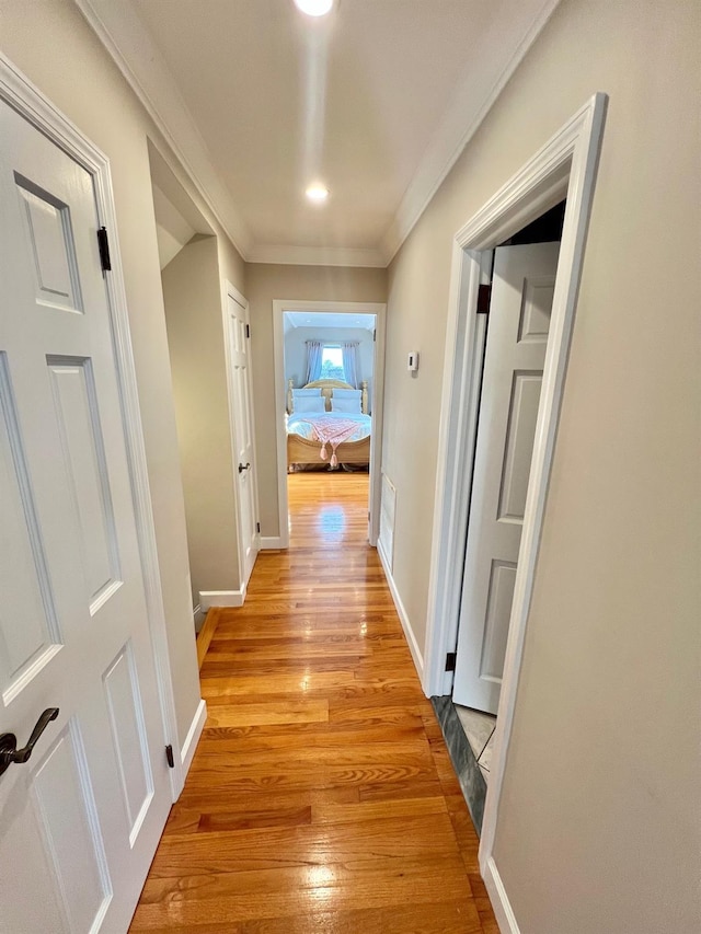1258 Mace Ave, Bronx, NY 10469 - hall with light wood finished floors, baseboards, and ornamental molding