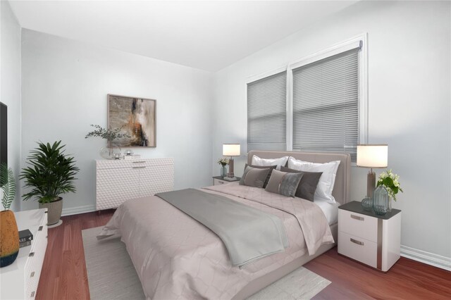 47-65 196th St, Flushing, NY 11358 - bedroom with wood finished floors and baseboards