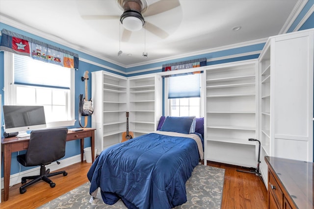 80 Park Ave, New Hyde Park, NY 11040 - bedroom featuring wood finished floors, crown molding, and ceiling fan