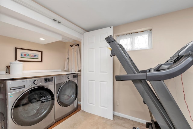 80 Park Ave, New Hyde Park, NY 11040 - laundry area with washing machine and dryer, light carpet, laundry area, and baseboards
