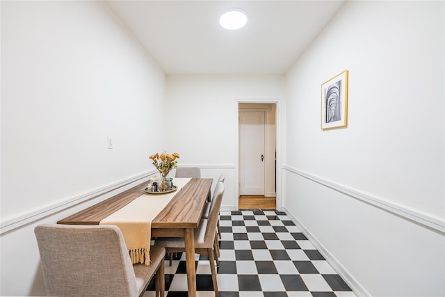 dining room with dark floors
