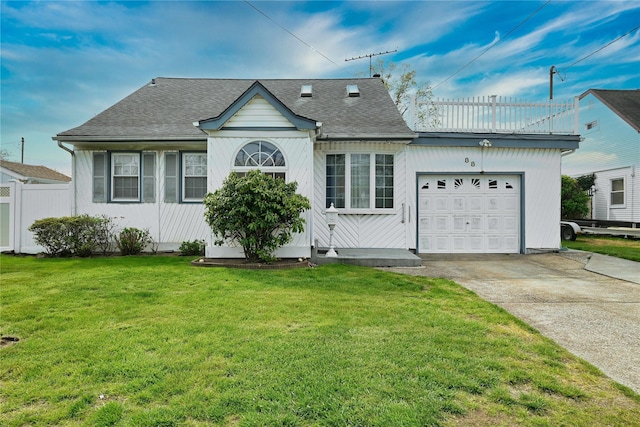 view of front facade featuring concrete driveway, a garage, a front lawn, and a shingled roof