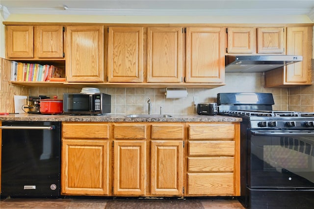 kitchen with under cabinet range hood, black appliances, backsplash, a sink, and crown molding