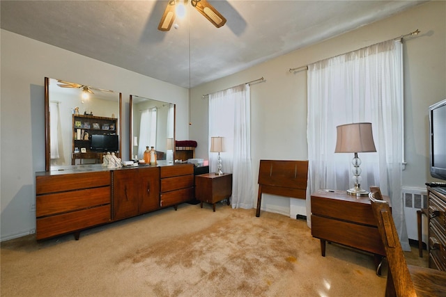bedroom with light colored carpet