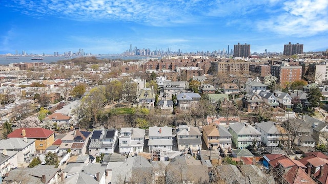 birds eye view of property with a residential view and a view of city
