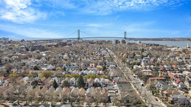 aerial view with a water view and a residential view