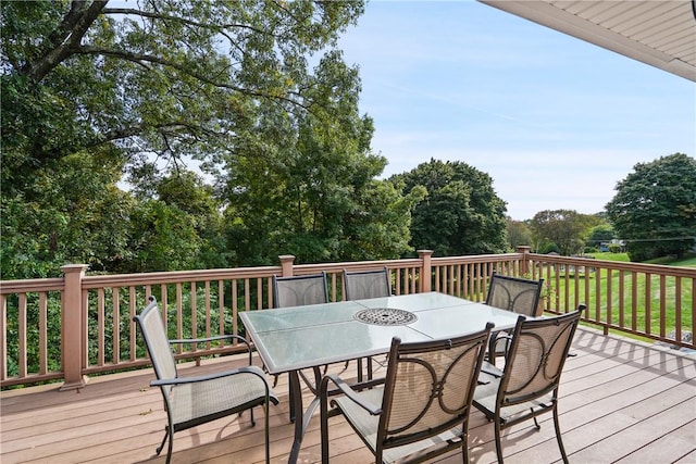 deck featuring outdoor dining area