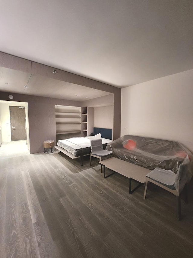 bedroom featuring wood finished floors