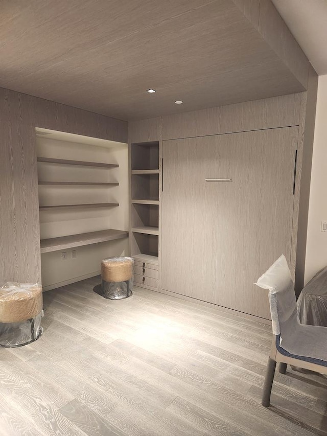 unfurnished room with wood finished floors
