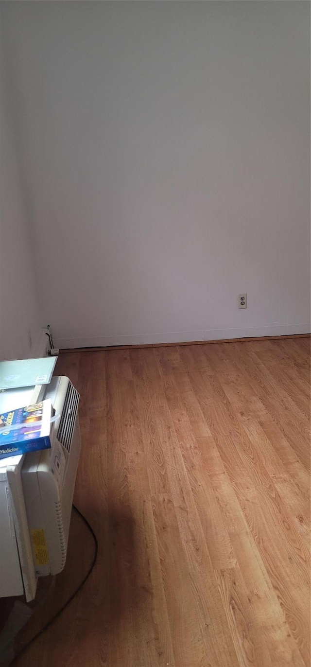 spare room with light wood-style flooring