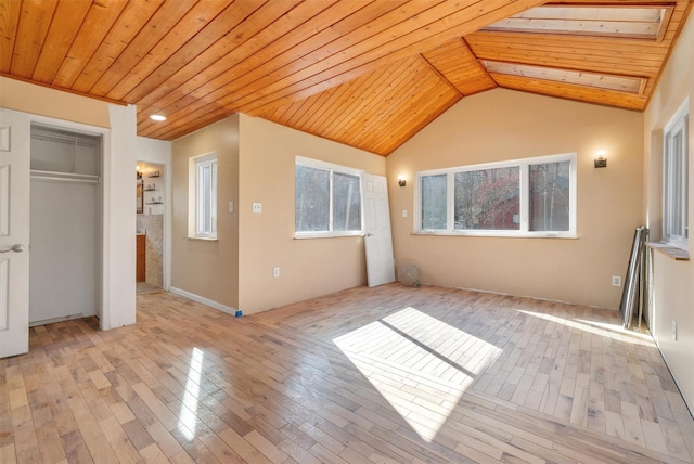 unfurnished bedroom with light wood finished floors, wooden ceiling, and vaulted ceiling