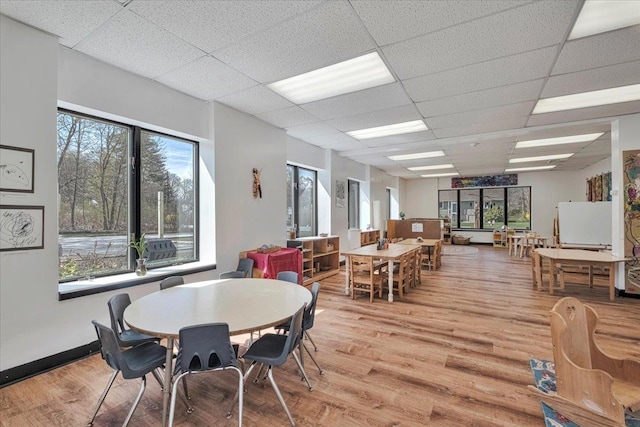 4 Glenna Dr, Carmel, NY 10512 - dining space with light wood-style floors and a paneled ceiling