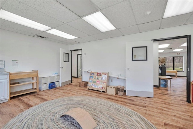 4 Glenna Dr, Carmel, NY 10512 - miscellaneous room with light wood-style flooring, visible vents, and a paneled ceiling