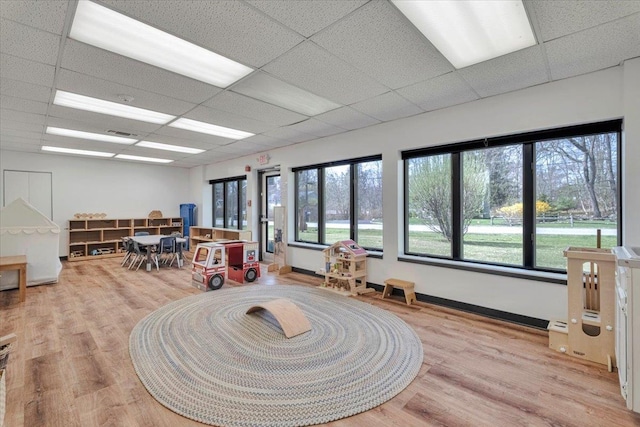 4 Glenna Dr, Carmel, NY 10512 - recreation room with visible vents, a paneled ceiling, and wood finished floors