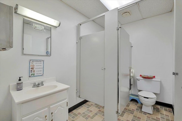 4 Glenna Dr, Carmel, NY 10512 - full bath featuring vanity, a drop ceiling, a shower, and toilet