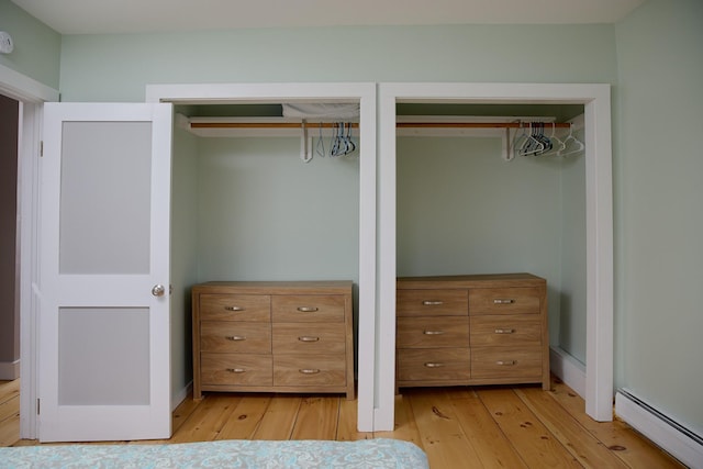 closet featuring baseboard heating