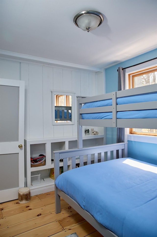 bedroom featuring light wood-style floors