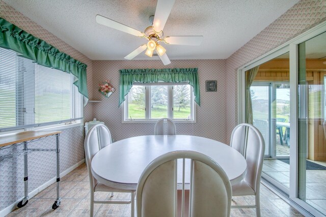 10 Joe D Dr Unit 10B, Callicoon, NY 12723 - dining area with a ceiling fan, a textured ceiling, and wallpapered walls