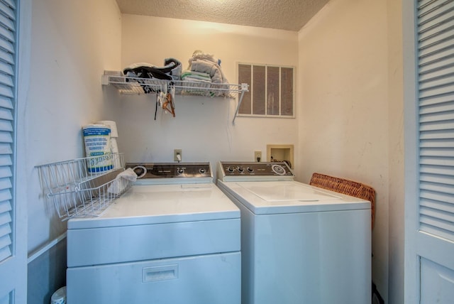 10 Joe D Dr Unit 10B, Callicoon, NY 12723 - laundry area featuring visible vents, a textured ceiling, and separate washer and dryer