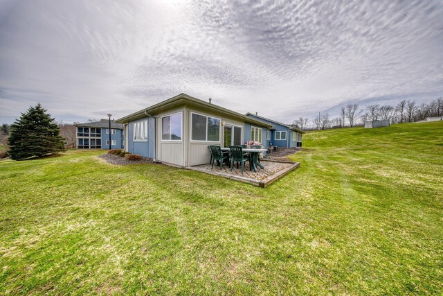 10 Joe D Dr Unit 10B, Callicoon, NY 12723 - rear view of property featuring a lawn and a patio