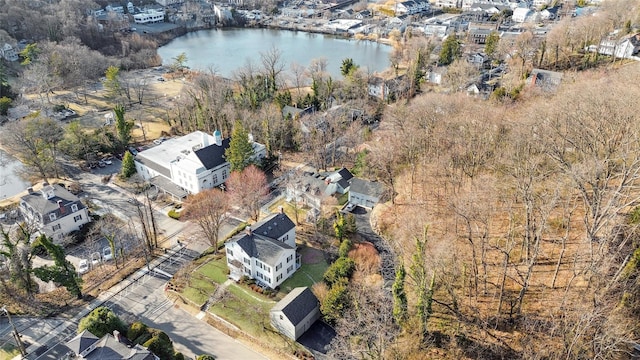 bird's eye view featuring a residential view and a water view