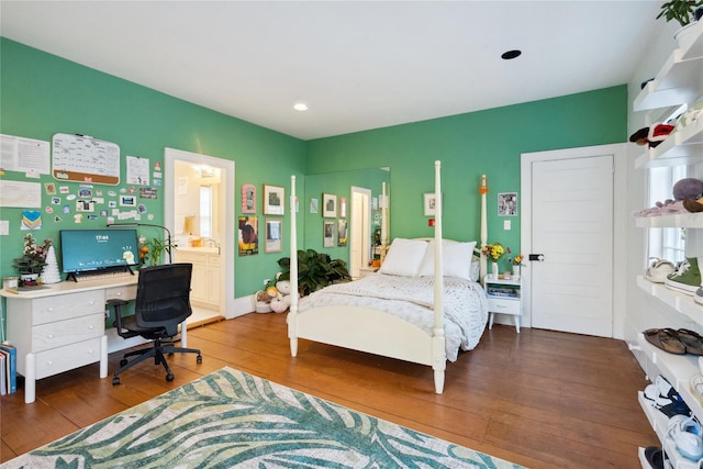 bedroom featuring wood-type flooring and recessed lighting