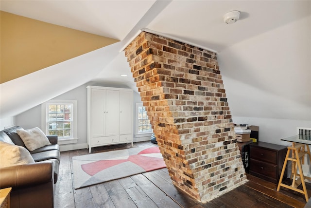 bonus room with wood-type flooring and lofted ceiling