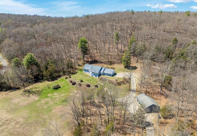 aerial view with a wooded view