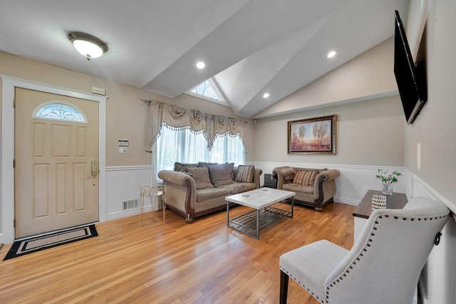 92 Dovecote Ln, Commack, NY 11725 - living room with light wood-style floors, lofted ceiling, recessed lighting, and visible vents