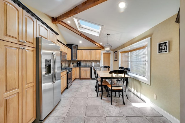 92 Dovecote Ln, Commack, NY 11725 - kitchen featuring decorative backsplash, light brown cabinetry, light tile patterned floors, lofted ceiling with skylight, and stainless steel appliances