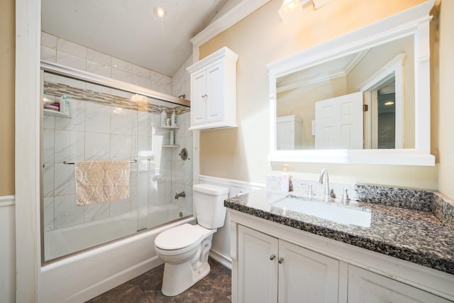 92 Dovecote Ln, Commack, NY 11725 - bathroom with vaulted ceiling, bath / shower combo with glass door, vanity, and toilet