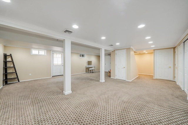 92 Dovecote Ln, Commack, NY 11725 - basement featuring visible vents, ornamental molding, recessed lighting, and light carpet