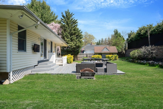 92 Dovecote Ln, Commack, NY 11725 - view of yard with fence and an outdoor living space with a fire pit