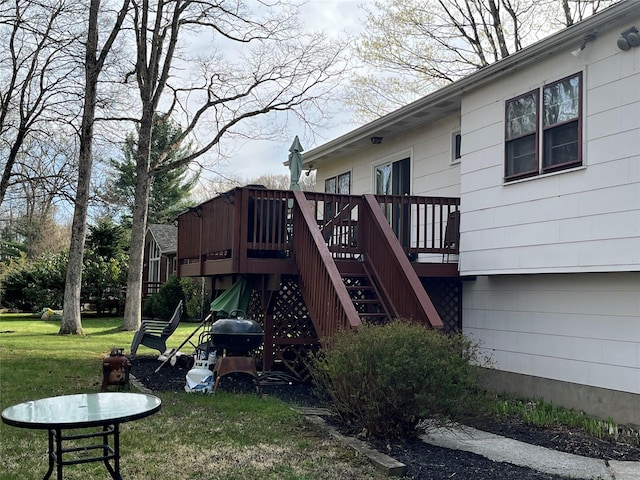 exterior space with a yard and stairs