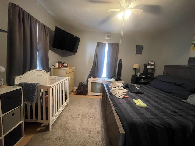 bedroom with carpet flooring and ceiling fan
