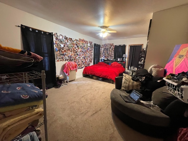 carpeted bedroom with a ceiling fan