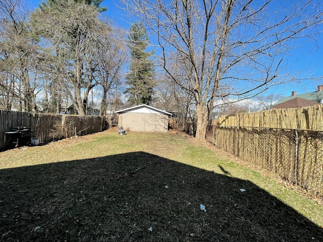 view of yard with a fenced backyard