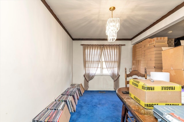 3530 Long Beach Rd Unit 68, Oceanside, NY 11572 - carpeted bedroom with crown molding and an inviting chandelier