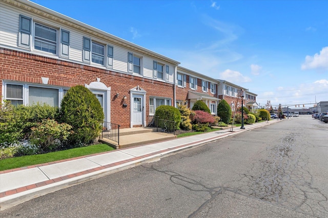 3530 Long Beach Rd Unit 68, Oceanside, NY 11572 - exterior space featuring curbs, sidewalks, and a residential view