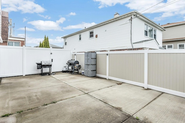 view of patio / terrace featuring grilling area and a fenced backyard