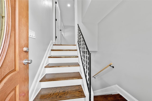 38 Moffitt Blvd, East Islip, NY 11730 - staircase featuring baseboards, wood finished floors, and recessed lighting