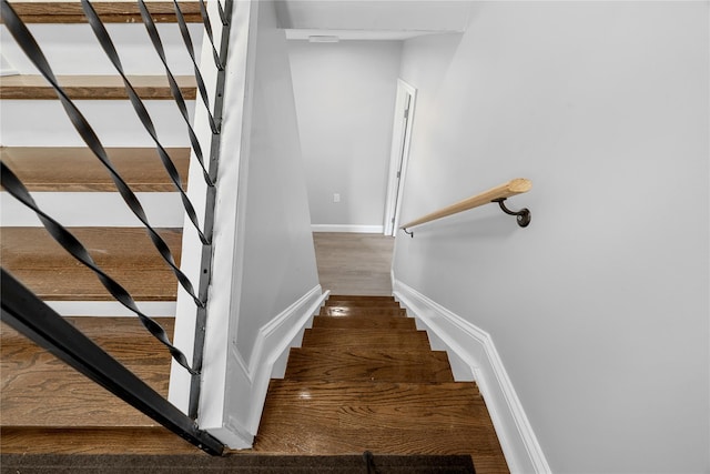 38 Moffitt Blvd, East Islip, NY 11730 - stairs with wood finished floors and baseboards