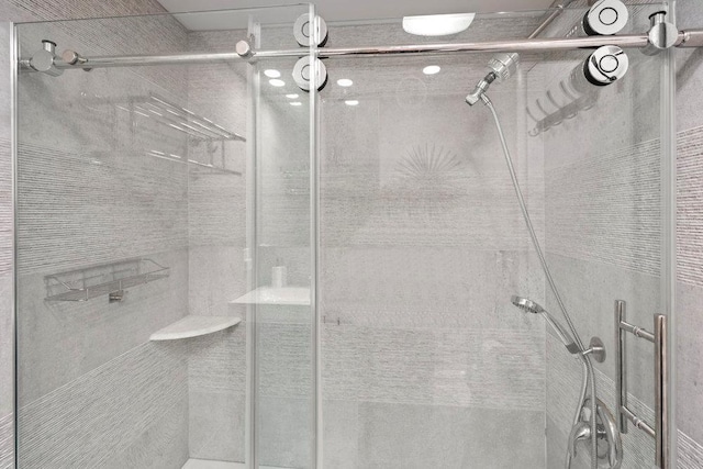 full bathroom featuring a stall shower
