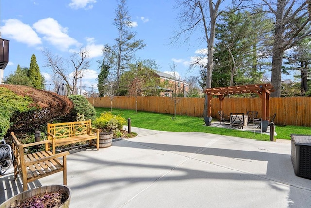 view of patio / terrace featuring a pergola and a fenced backyard