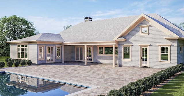 2215 Laurel Ave, Southold, NY 11971 - rear view of property with a chimney, a patio, and french doors