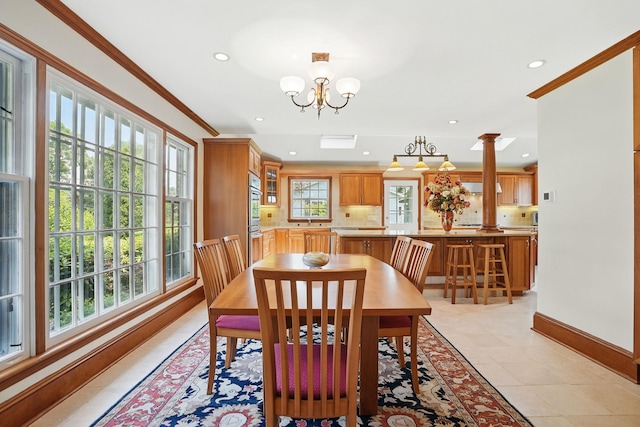 1449 Riverview Ave, Peekskill, NY 10566 - dining room featuring recessed lighting, crown molding, baseboards, a chandelier, and light tile patterned floors