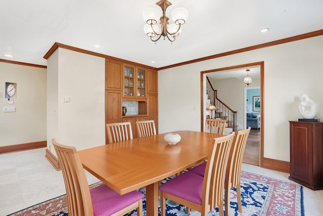 1449 Riverview Ave, Peekskill, NY 10566 - dining space with a chandelier, stairs, recessed lighting, crown molding, and baseboards